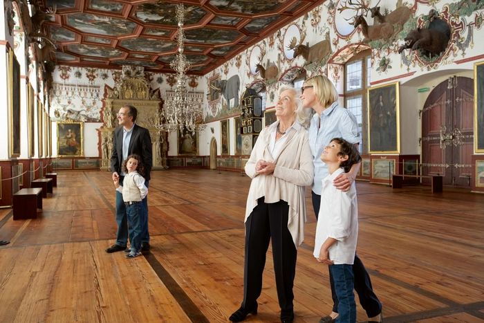 Weikersheim Palace, visitors in the Knight's Hall
