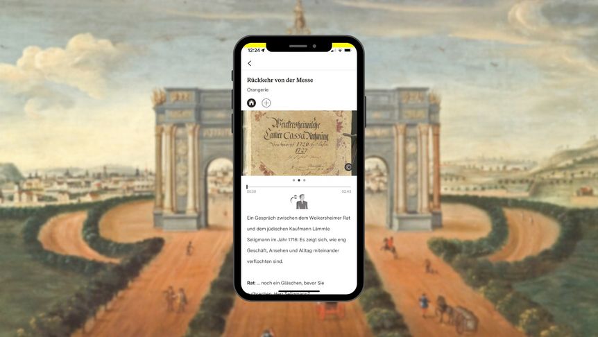 Smartphone mit Vielfalt-Station vor einem Gemälde im Rittersaal von Schloss Weikersheim mit Kutschen in einer Landschaft